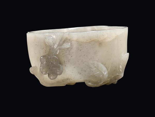 A small white jade flower libation cup, China, Qing Dynasty, Qianlong period (1736-1796)