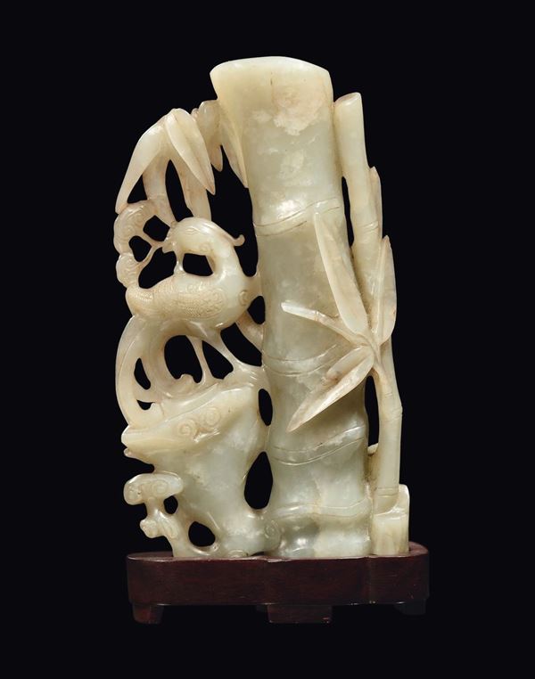 A small Celadon jade vase with bamboo, flowers and bird, China, Ming Dynasty, 17th century