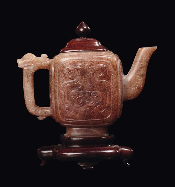 A yellow jade and russet teapot, China, Ming Dynasty, 17th century
