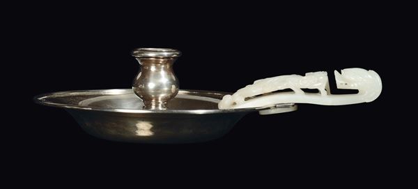A silver candlestick with white jade buckle, China, Qing Dynasty, Qianlong period (1736-1796)