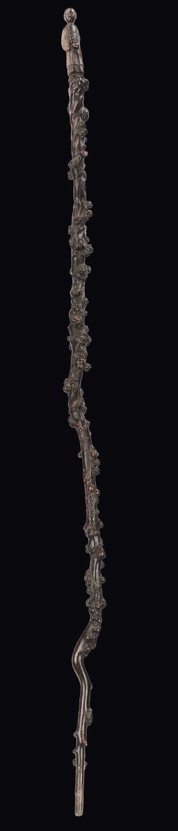A carved wood stick, China, Qing Dynasty, 19th century