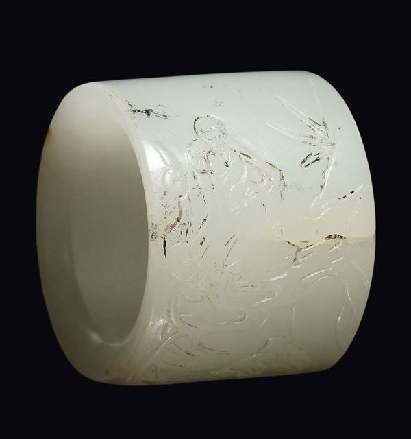 A carved white jade bowman ring, China, Qing Dynasty, Qianlong period (1736-1796)