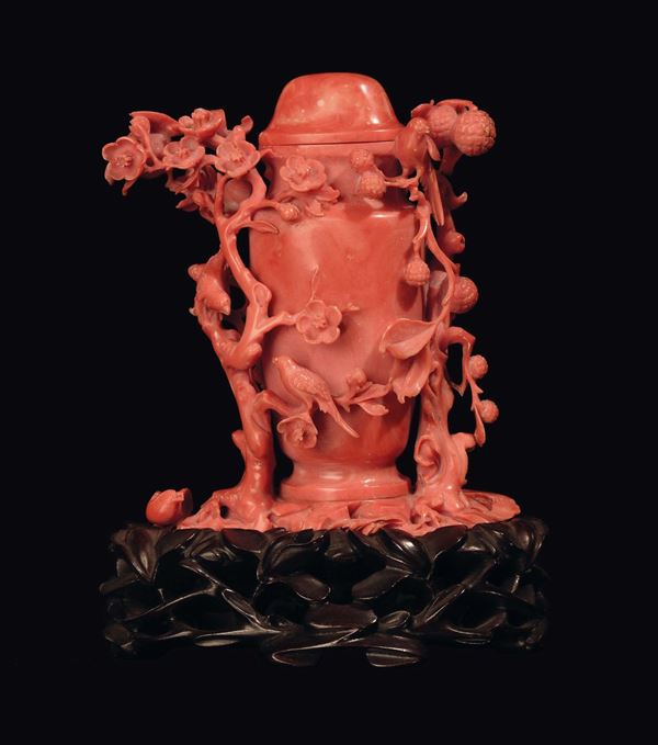 A sculpted coral vase with flowers, China, Qing Dynasty, late 19th century