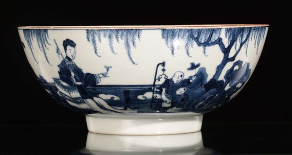 A large blue and white bowl with Guanyin and children, China, Qing Dynasty, Qianlong period (1736-1796)