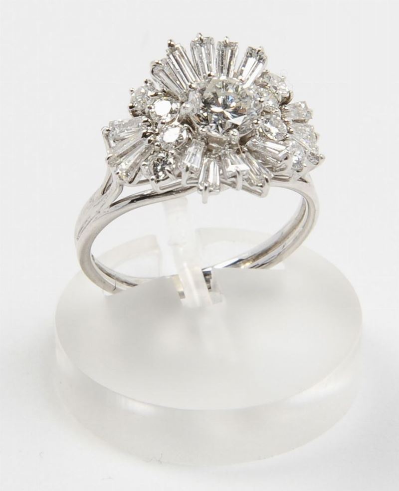 Anello con diamante centrale taglio brillante di ct 0,75 circa  - Asta Fine Jewels - I - Cambi Casa d'Aste