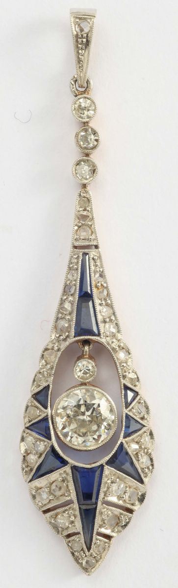 A sapphire, old cut diamond, gold and silver pendent