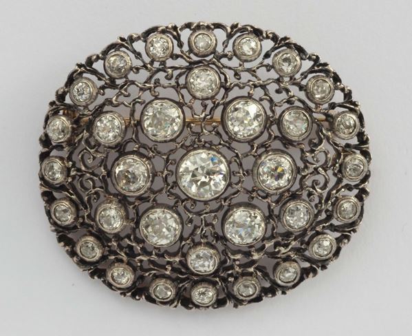 An old cut diamond, gold and silver brooch