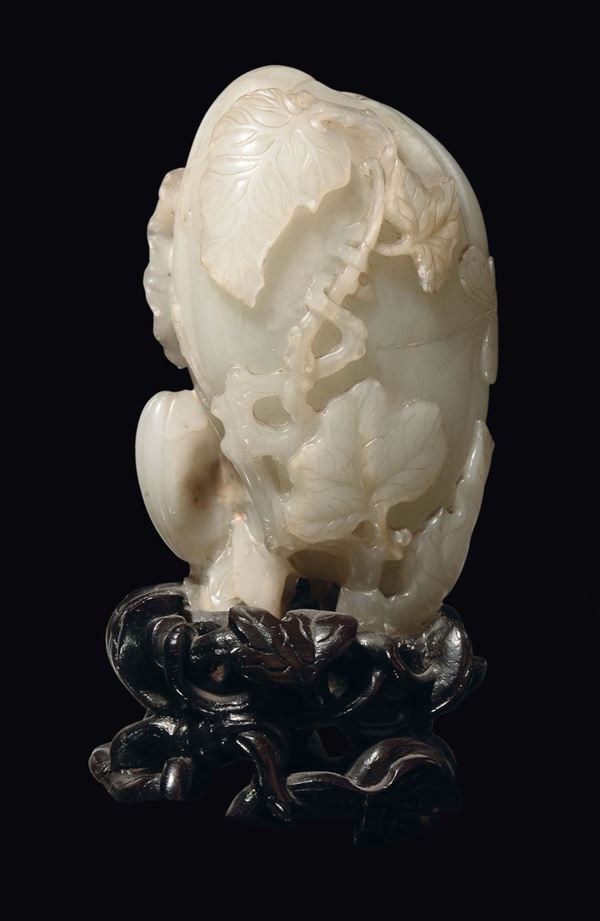 A Celadon jade mountain with leaves and naturalistic elements, China, Qing Dynasty, Qianlong period (1736-1796)