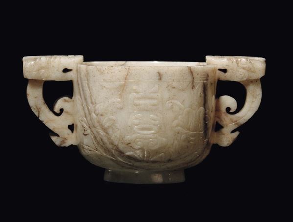 An archaic jade cup with dragon handles, China, Ming Dynasty, 17th century
