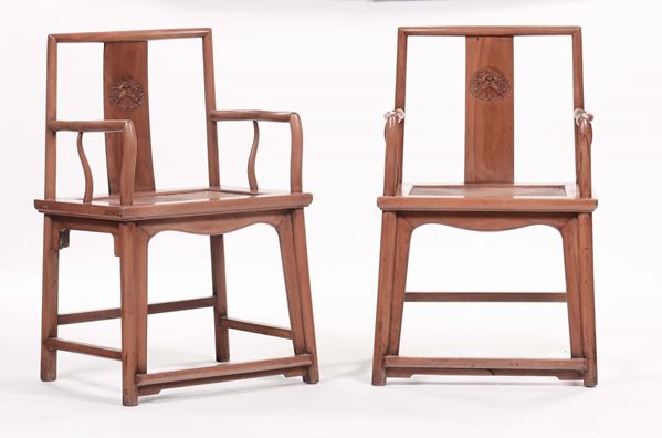 A pair of carved wood armchairs, China, Qing Dynasty, 19th century