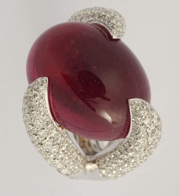 A rubellite cabochon and diamond pavé ring. By Brarda