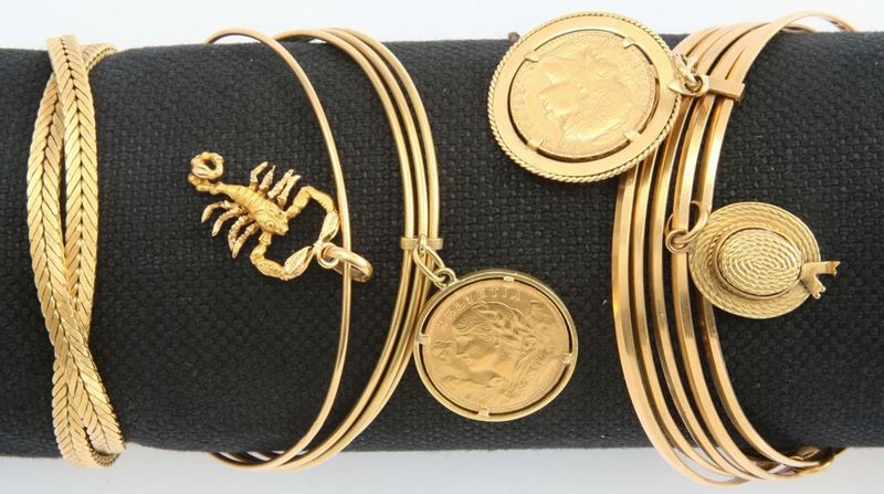 A lot of three gold bangles and one gold bracelet  - Auction Fine Jewels - I - Cambi Casa d'Aste