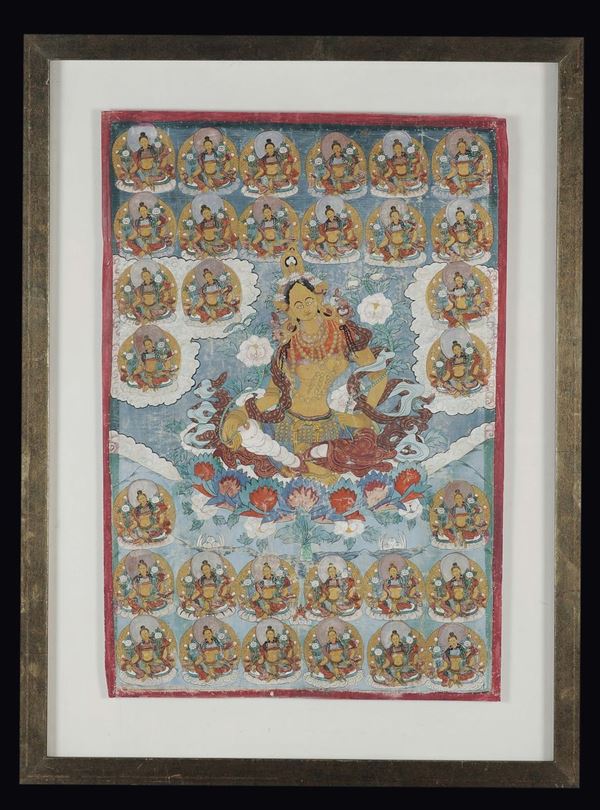 A framed tanka green-ground with numerous deities, Tibet, 19th century