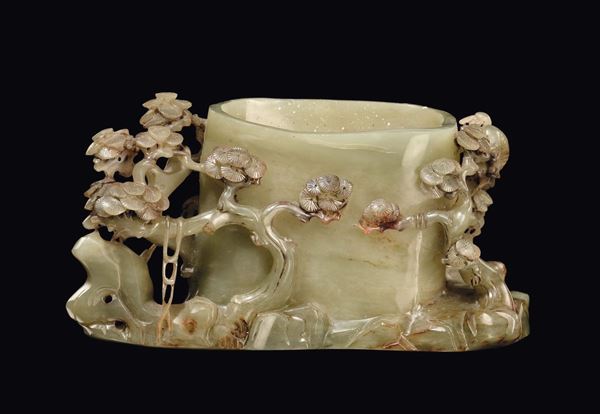 A Celadon jade brush bowl with floral decoration, China, Qing Dynasty, late 19th century