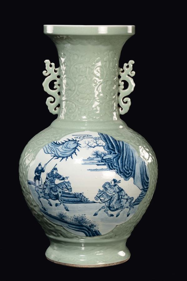 A large Celadon porcelain vase with blue and white reserves representing people in a landscape, China, Qing Dynasty, Daoguang period (1821-1850)