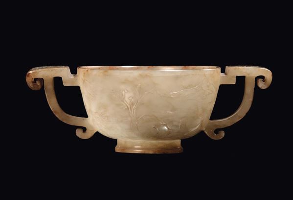 A small white jade and russet ceremonial cup with handles, China, Qing Dynasty, Qianlong period (1736-1796)