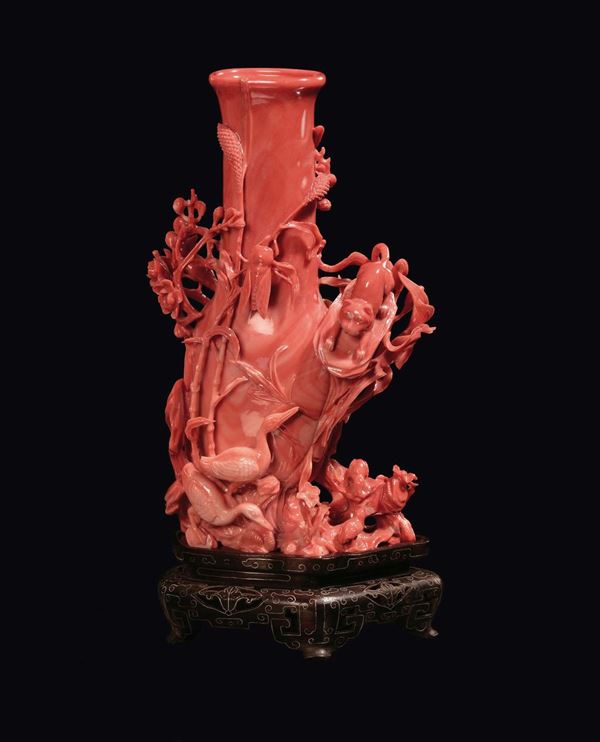 A small coral vase with relief animals, China, Qing Dynasty, late 19th century
