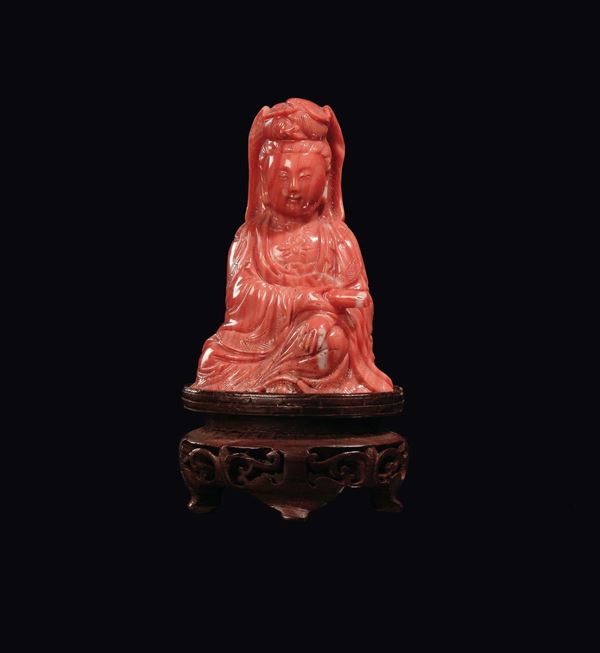 A small coral sitting Guanyin with parchment, China early 20th century