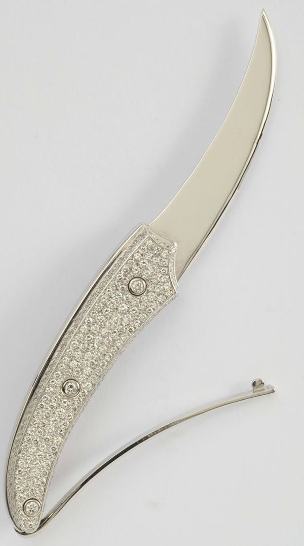A diamond pavé and gold knife