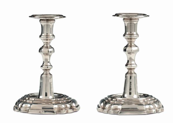 A pair of molten and embossed silver candlesticks, San Michele workshop in Milan, second half 18th century