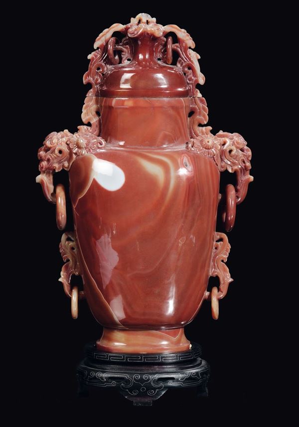 A large agate or orange cornelian vase with handles and rings, China, Republic, 20th century