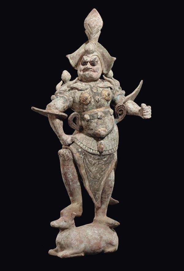 A large painted pottery figure of warrior, China, Tang Dynasty (618-906)