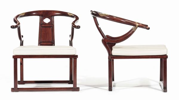 A pair of Homu wood armchairs, China, Qing Dynasty, 19th century