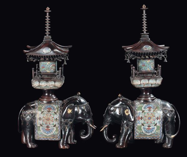 A large pair of bronze and cloisonnè elephants with pagoda, Japan, 19th century
