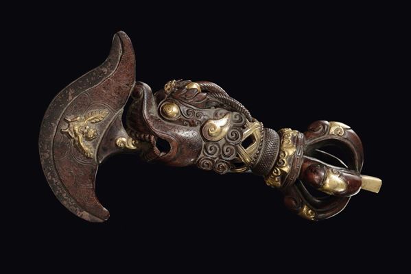 A bronze and gilt bronze “animal head” ritual object with relief decorations, Tibet, 18th century