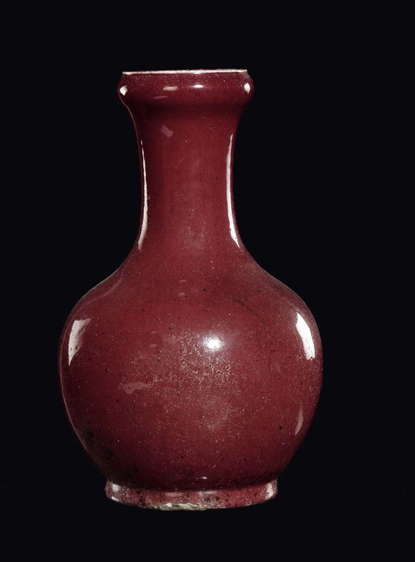 A flambè red porcelain vase, China, Qing Dynasty, 19th century
