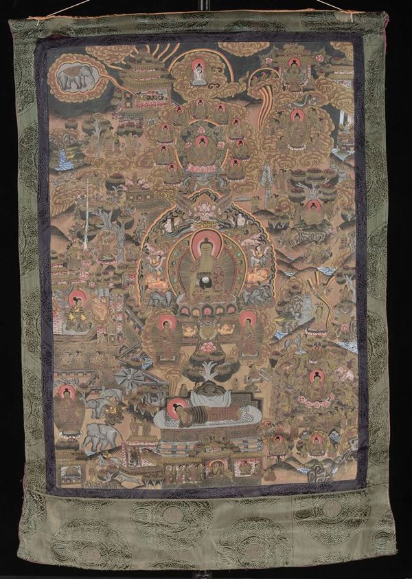Tanka a fondo blu e oro con Buddha e altre divinità, Tibet, XIX secolo