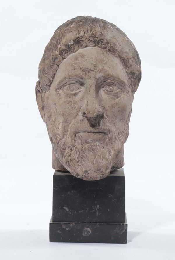 Testa in pietra scolpita, XX secolo