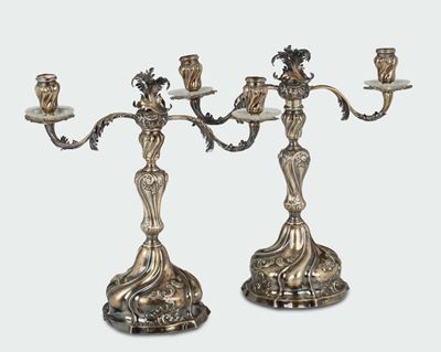 Coppia di Candelabri in Argento Fuso, Sbalzato e Cesellato in Stile Barocchetto Genovese, Punzoni...