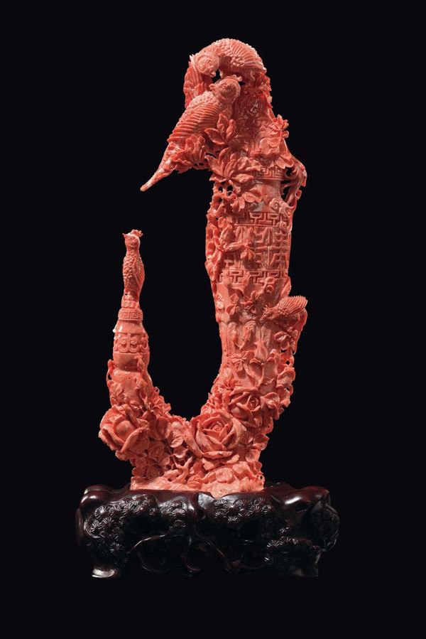 A carved coral group with parrots and vases, China, Qing Dynasty, late 19th century
