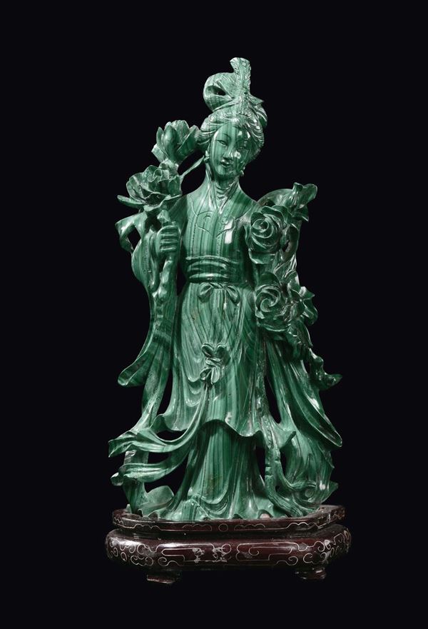 A pair of malachite Guanyin with roses, China, Qing Dynasty, 19th century