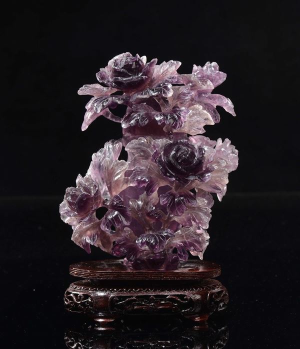 An agate vase and cover with roses in relief, China, 20th century