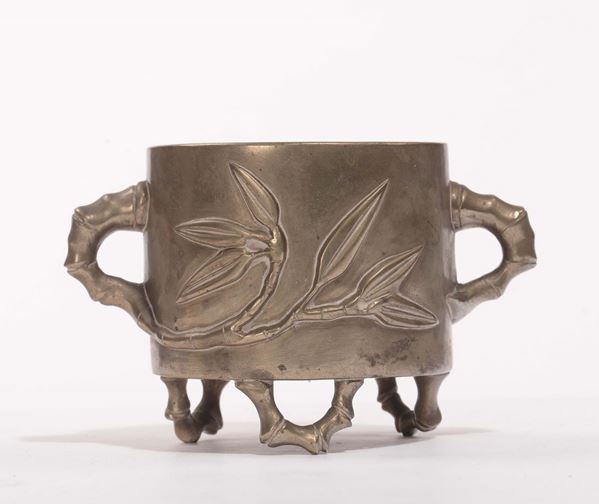 A gilt bronze tripod censer with bamboo decoration in relief, China, 20th century