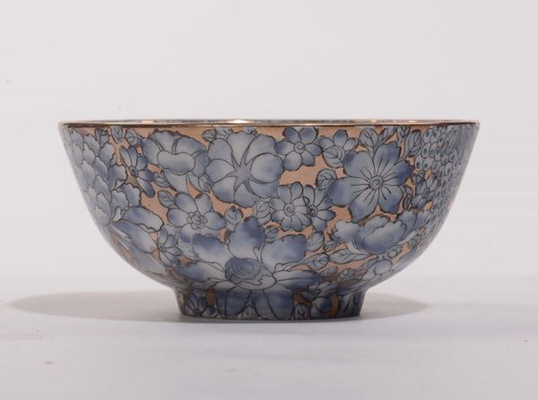 A porcelain gold-ground cup with light blue flowers, China, 20th century
