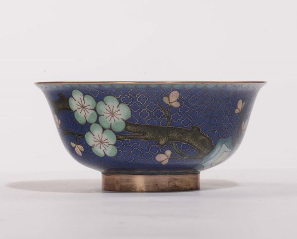 A cloisonné blue-ground cup with peach blossom, China, 20th century
