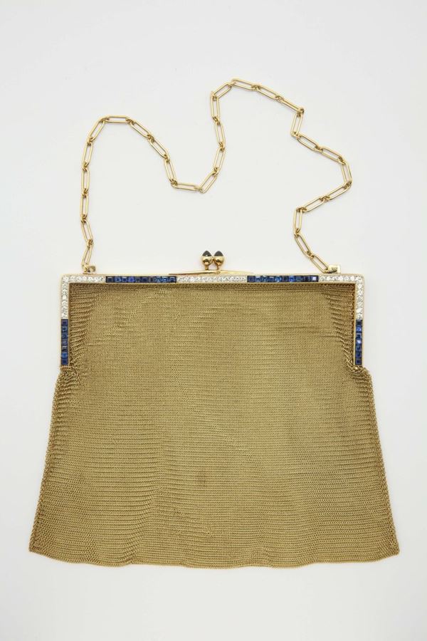 A 14Kt gold evening mesh bag with diamond and sapphire