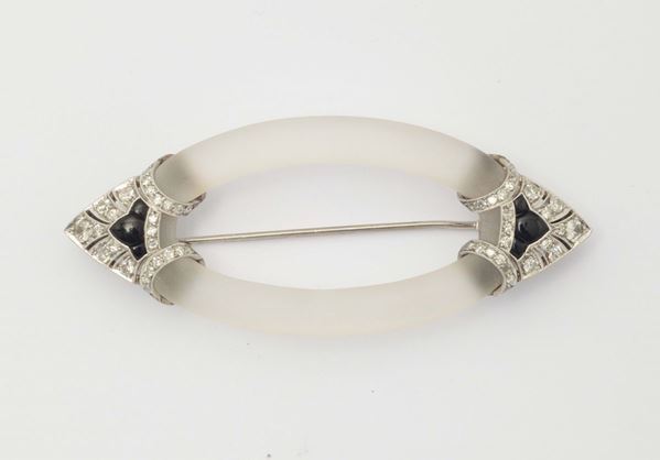 A rock crystal, diamond and enamel brooch