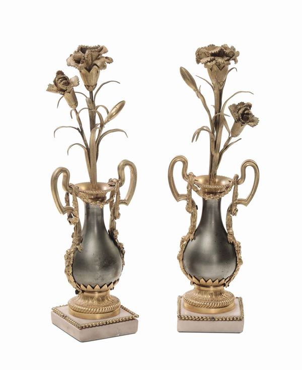 Coppia di candelieri in metallo e bronzo dorato, XIX secolo