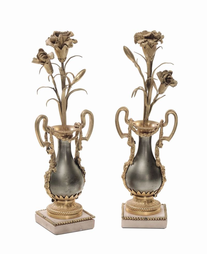 Coppia di candelieri in metallo e bronzo dorato, XIX secolo  - Auction Fine Arts from refined private house - Cambi Casa d'Aste