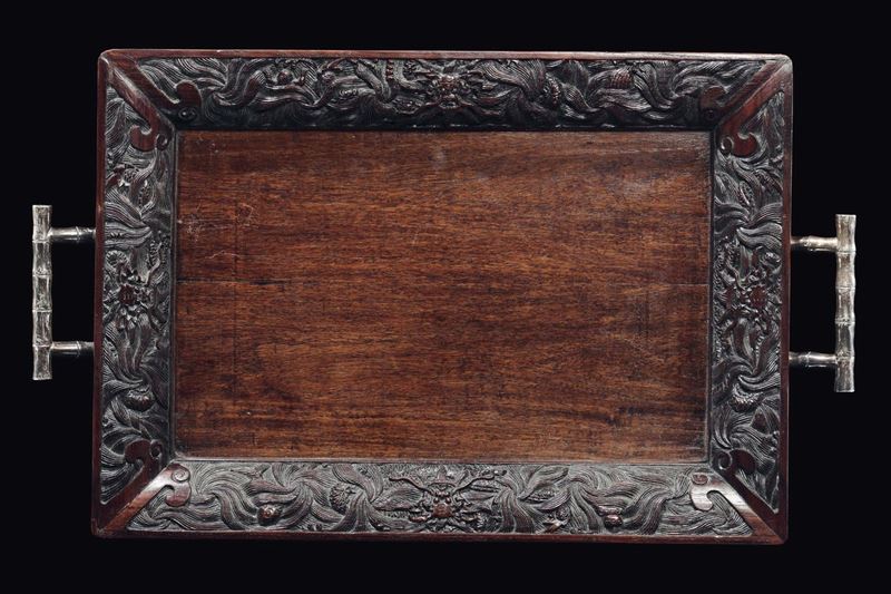 A wooden tray with carved plant motif edge and silver bamboo handles, China, Qing Dynasty, late 19th century  - Auction Chinese Works of Art - Cambi Casa d'Aste