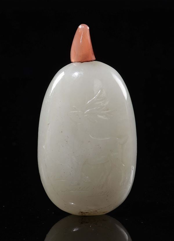 A white jade snuff bottle with dears, China, early 20th century