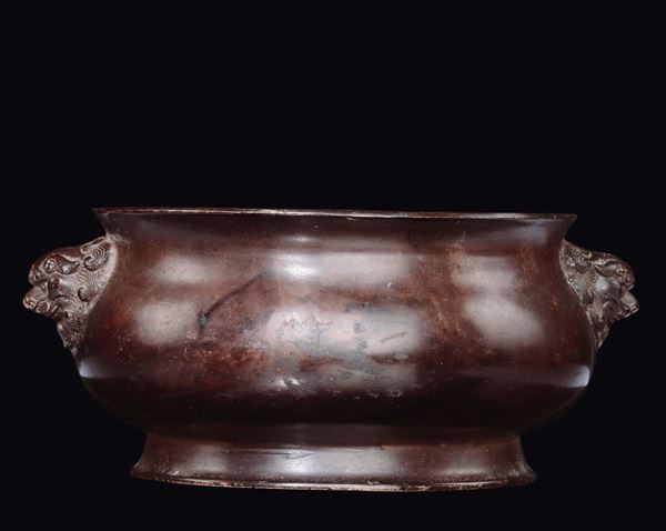 A bronze censer with Pho dogs handles, China, Qing Dynasty, 19th century