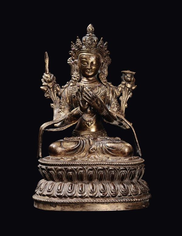 A gilt bronze Tara on a double lotus flower, China, Qing Dynasty, 19th century