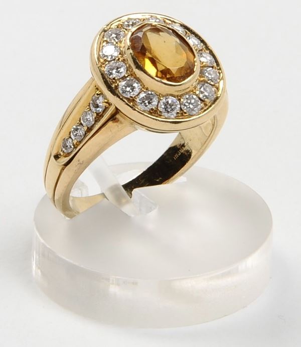 A citrine and diamond ring. Signed Petochi