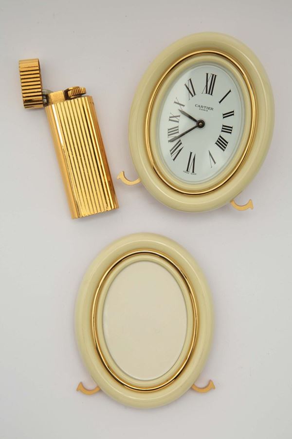 Cartier, orologio da tavolo, cornice en suite ed accendino