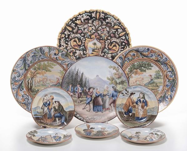 :Lotti di piatti e piattini in porcellana in stile Castelli, XX secolo